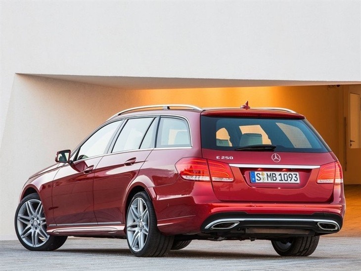 The Back of a Mercedes Benz E Class Estate in Red 