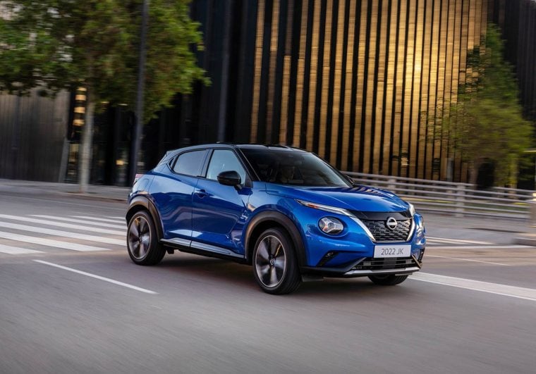 Nissan Juke in blue driving on the road