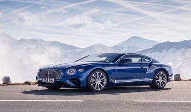 A Bentley Continental GT car parked on the road.