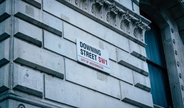 Downing Street sign on wall