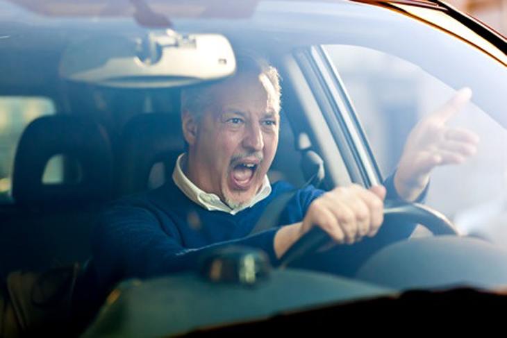 Car driver experiencing road rage