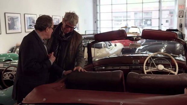Car Salesman in showroom Car Salesman in showroom