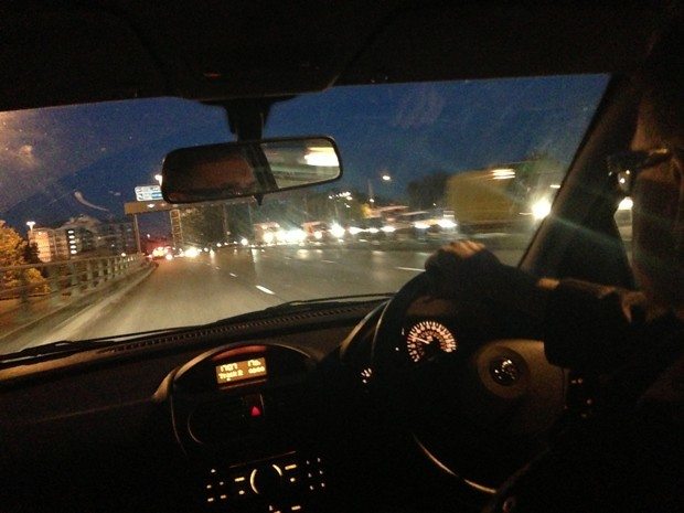 Car driving on a UK road at night Car driving on a UK road at night