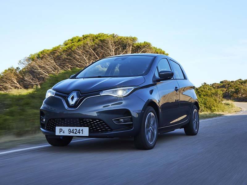 black renault zoe driving on country road