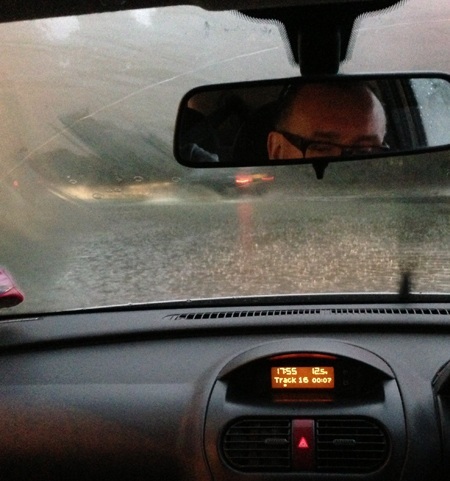 Driving in the rain on a UK road Driving in the rain on a UK road