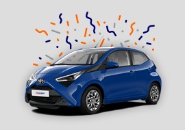 blue toyota aygo with blue and orange streamers