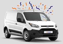 white ford transit with blue and orange streamers