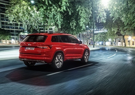 The new Skoda Kodiaq Sportline on the road rear view