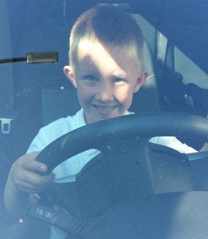 Young Boy pretending to Drive a car Young Boy pretending to Drive a car