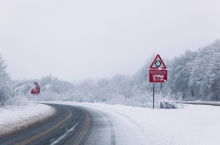 Winter conditions with a snowy road