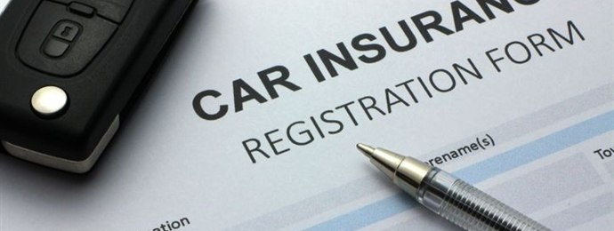 A car insurance form and a car key