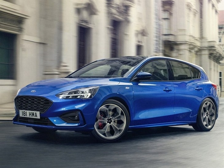 A Side View of the 2018 For Focus in Blue Driving