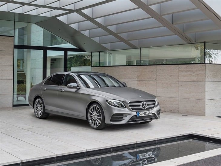 A Front view of a Mercedes Benz E Class Saloon in Silver