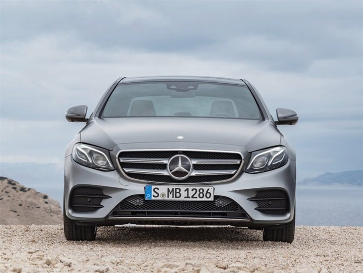 A Head on View of the front of a Mercedes Benz E Class Saloon in Silver 