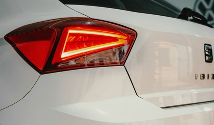 a white car parked in a parking lot