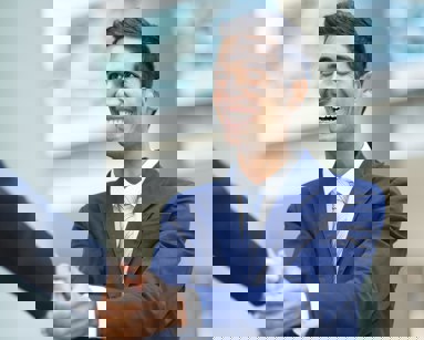 man in suit shaking hands