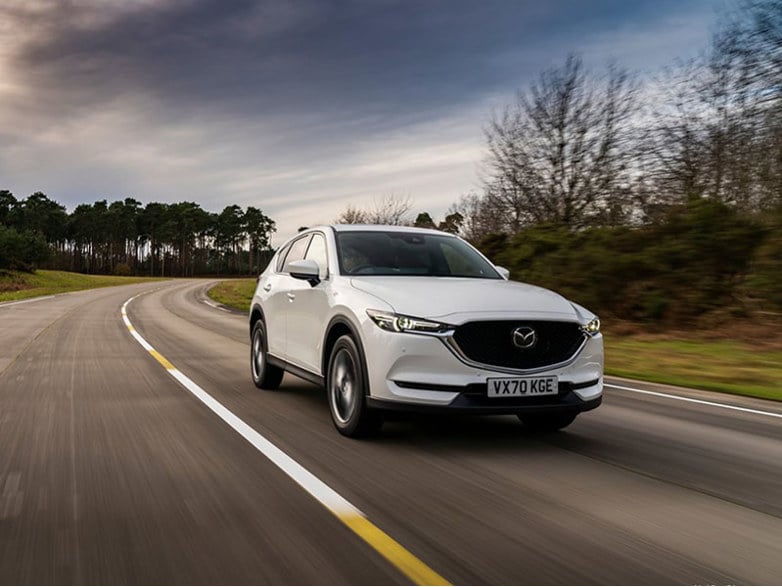 mazda cx-5 driving on road