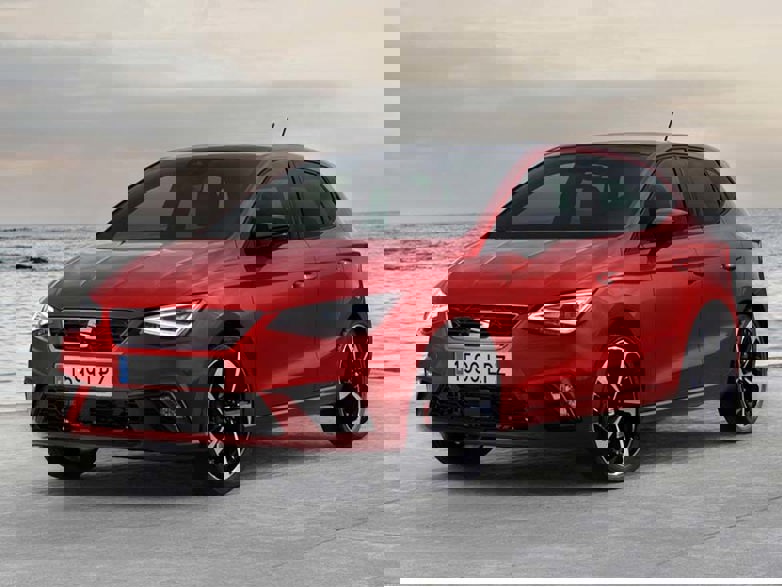 Red Seat Ibiza next to the ocean