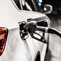 white car with fuel pump attached