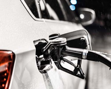 white car with fuel pump attached