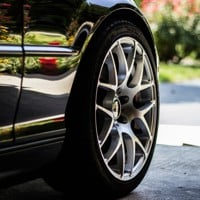 grey vehicle rim with tire