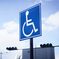 close up of disabled parking sign