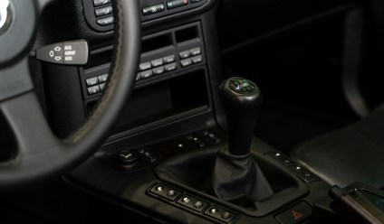 a steering wheel and dashboard of a car