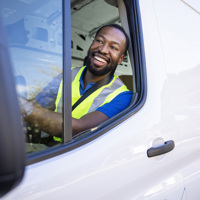 man making deliveries from his cargo van on a sunny day