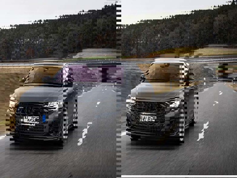 grey audi a8 saloon driving on road