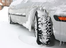 car covered in snow and ice