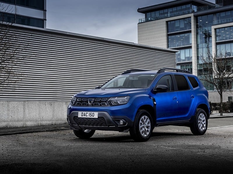 exterior of a blue dacia duster commercial