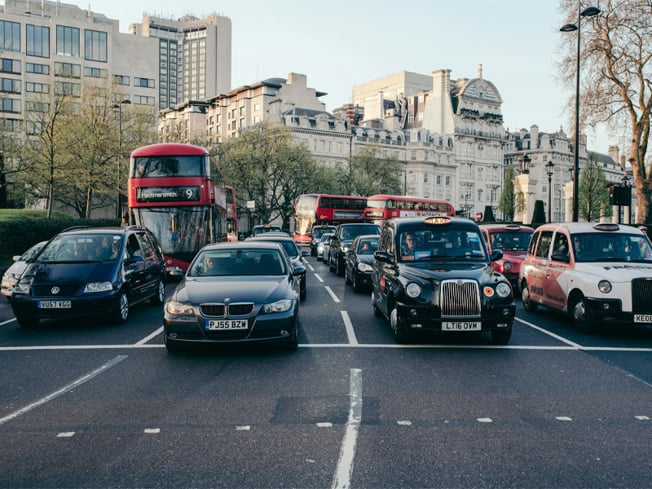 Cars and buses in London stuck in traffic