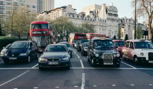 Cars and buses in London stuck in traffic