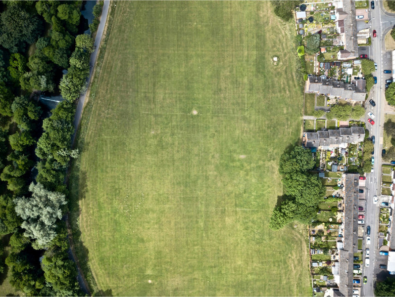 Aerial view of playing fields in a suburban setting