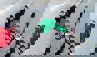 Petrol pump in a white car