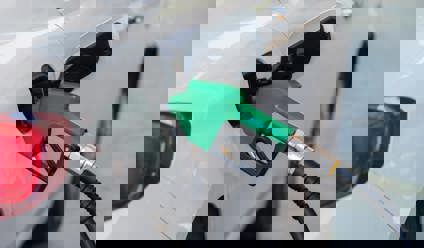 Petrol pump in a white car