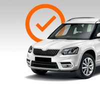 white car with tick graphic