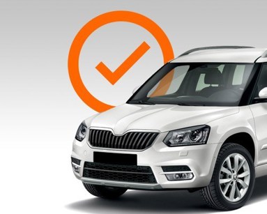 white car with tick graphic