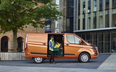 The new Ford Transit Custom commercial vehicle in action