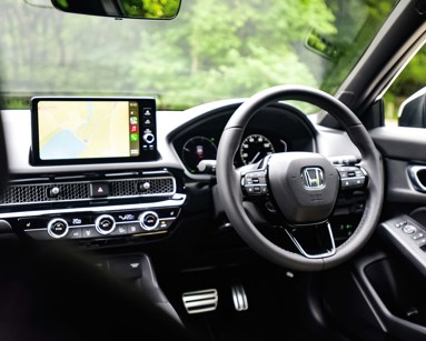 Honda lease car with infotainment system connected to Apple CarPlay