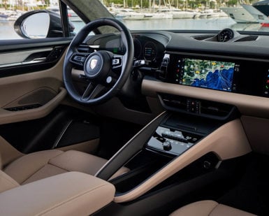 Porsche Macan-E steering wheel and infotainment system