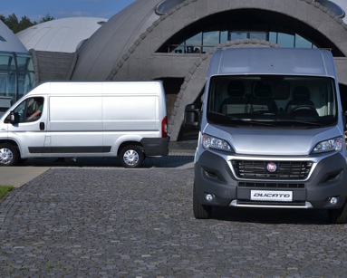 blue and silver fiat vans