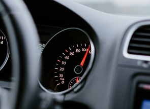 black car dashboard with speedometer