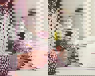 close up of man signing documents