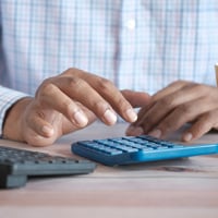 person using black computer keyboard