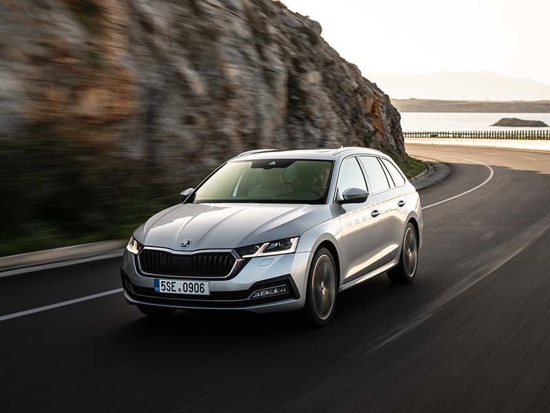 Silver Skoda Octavia Estate on cliff road