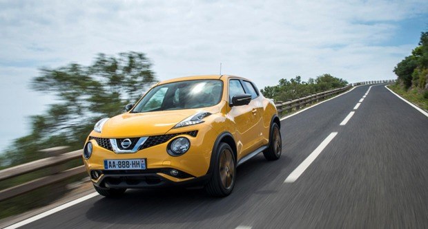 The Front of a yellow Nissan Juke