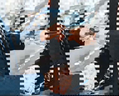 close up of hands shaking and exchanging car keys