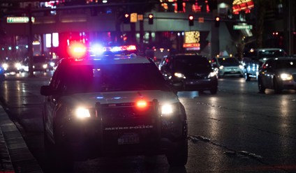 black car on road during night time
