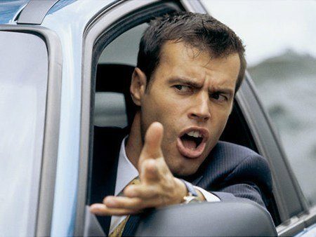 Angry Driver leaning out of car